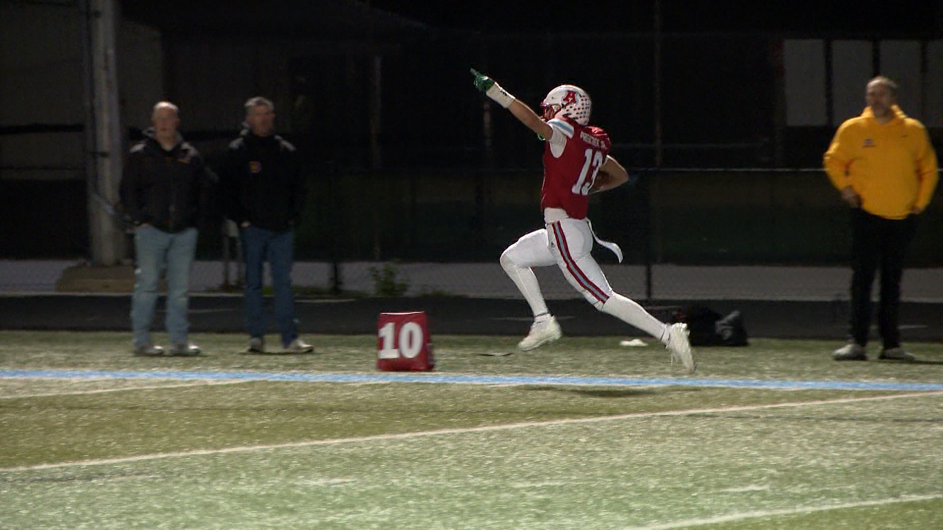 Brookfield Central High School football team in action during a playoff game.